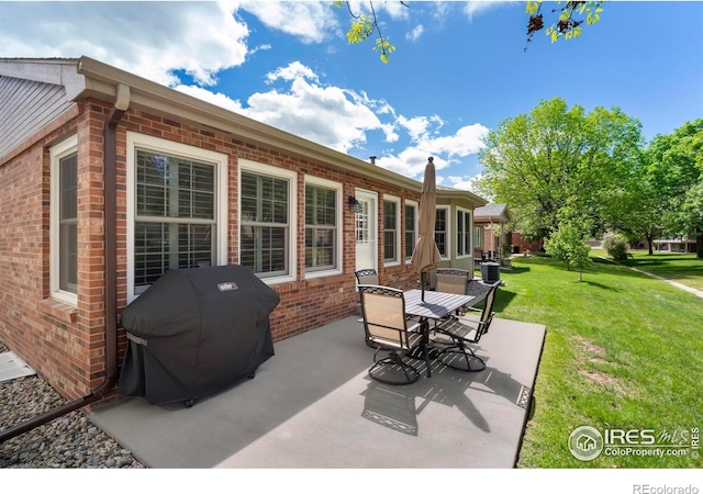 1142 Muirfield Way, Fort Collins, CO 80525 - view of patio / terrace with outdoor dining area and a grill