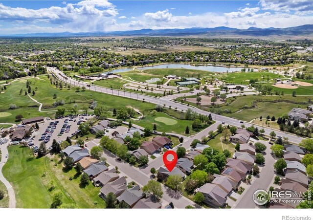 1142 Muirfield Way, Fort Collins, CO 80525 - aerial view of residential area with a water and mountain view and a local golf course