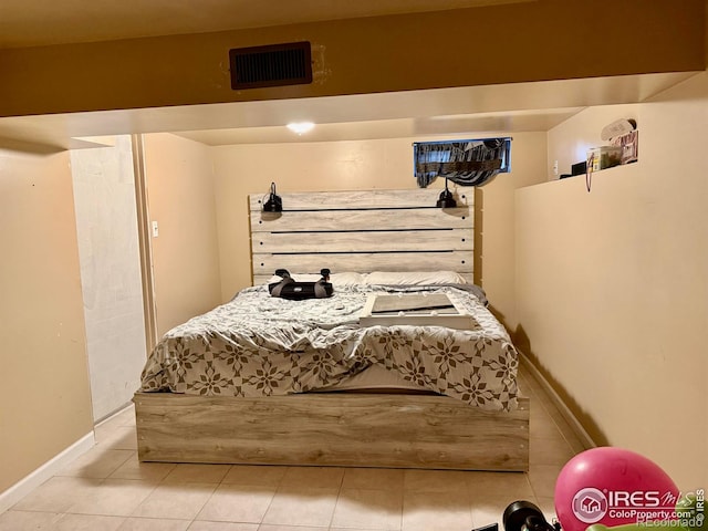 541 S Phelan Ave, Holyoke, CO 80734 - bedroom featuring tile patterned floors and baseboards