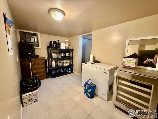 541 S Phelan Ave, Holyoke, CO 80734 - washroom with beverage cooler and light tile patterned flooring