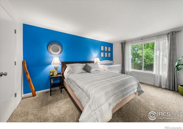 420 E 50th St, Loveland, CO 80538 - bedroom featuring carpet flooring and baseboards