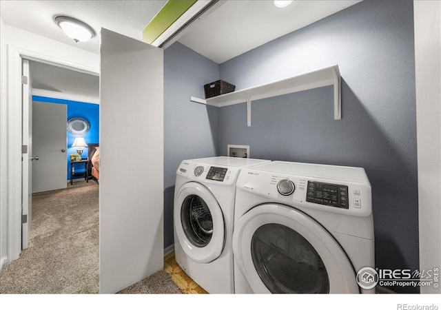420 E 50th St, Loveland, CO 80538 - laundry room featuring washer and dryer and light carpet