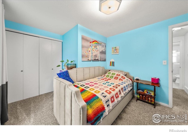 420 E 50th St, Loveland, CO 80538 - bedroom featuring carpet floors and a closet