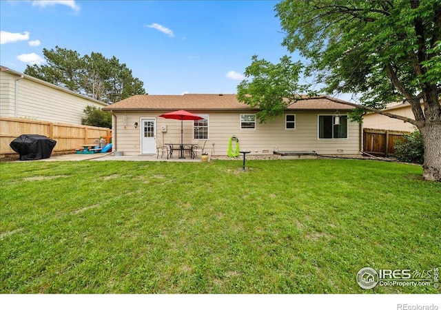 420 E 50th St, Loveland, CO 80538 - rear view of house featuring a patio area