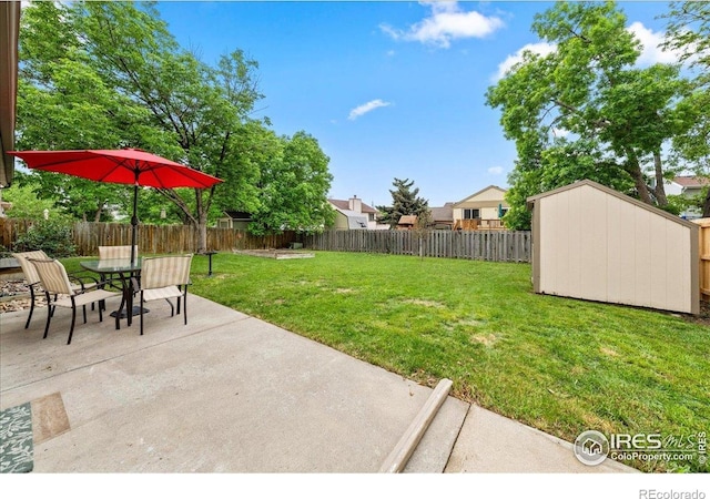 420 E 50th St, Loveland, CO 80538 - view of yard featuring a patio area and outdoor dining space