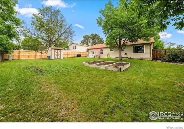 420 E 50th St, Loveland, CO 80538 - view of yard featuring a vegetable garden