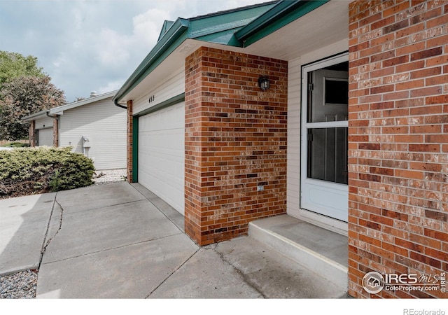 455 Radiant Dr, Loveland, CO 80538 - garage featuring driveway