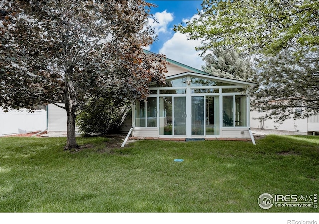 455 Radiant Dr, Loveland, CO 80538 - back of property featuring a sunroom