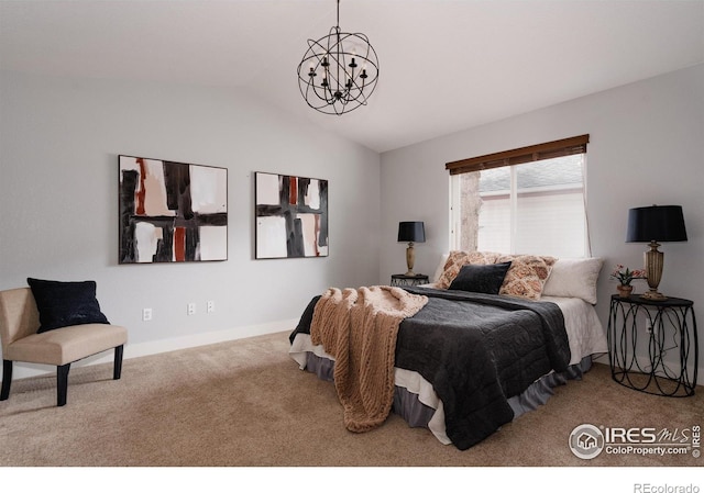 455 Radiant Dr, Loveland, CO 80538 - carpeted bedroom featuring a chandelier, lofted ceiling, and baseboards
