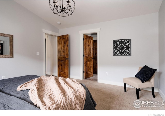 455 Radiant Dr, Loveland, CO 80538 - carpeted bedroom with a chandelier and baseboards