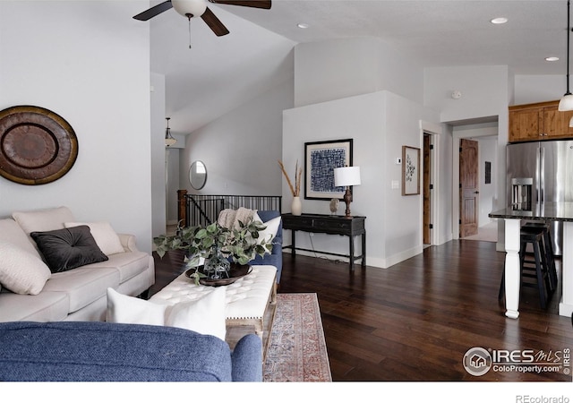 455 Radiant Dr, Loveland, CO 80538 - living area featuring a ceiling fan, high vaulted ceiling, dark wood-style flooring, recessed lighting, and baseboards