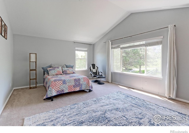 7858 Oban Ct, Lone Tree, CO 80124 - bedroom with carpet flooring, vaulted ceiling, and baseboards