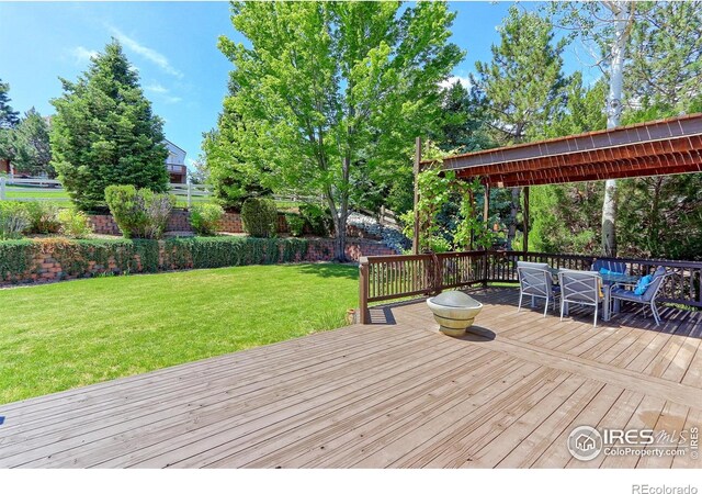 7858 Oban Ct, Lone Tree, CO 80124 - deck featuring a lawn and outdoor dining space