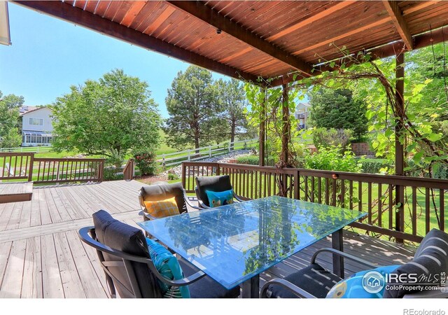 7858 Oban Ct, Lone Tree, CO 80124 - wooden terrace featuring outdoor dining space