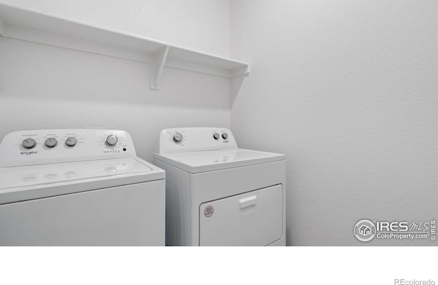 4709 Lynxes Way, Johnstown, CO 80534 - washroom with washing machine and dryer