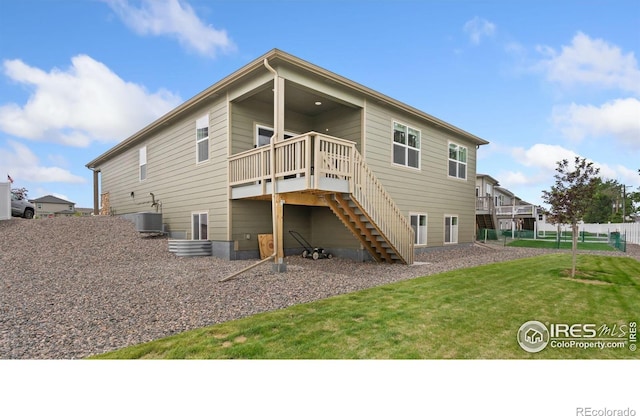 4709 Lynxes Way, Johnstown, CO 80534 - back of house featuring stairway, central AC, and a wooden deck