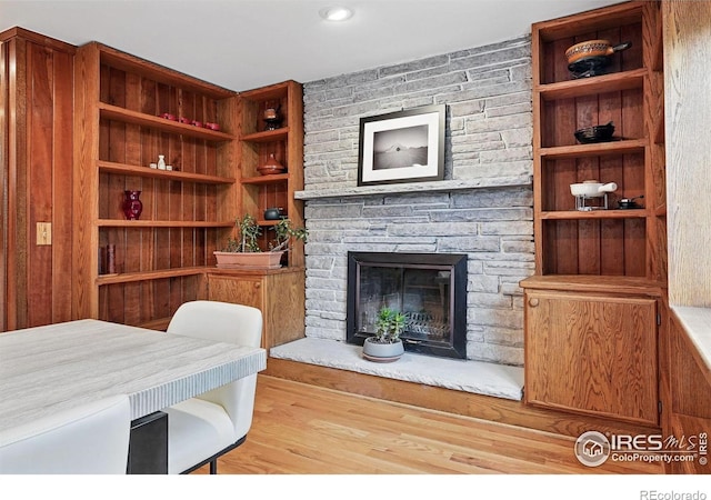 1484 Wicklow St, Boulder, CO 80303 - living area featuring wood finished floors and a fireplace