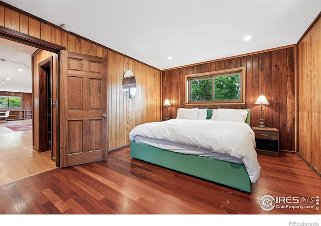 1484 Wicklow St, Boulder, CO 80303 - bedroom with wood walls and wood finished floors