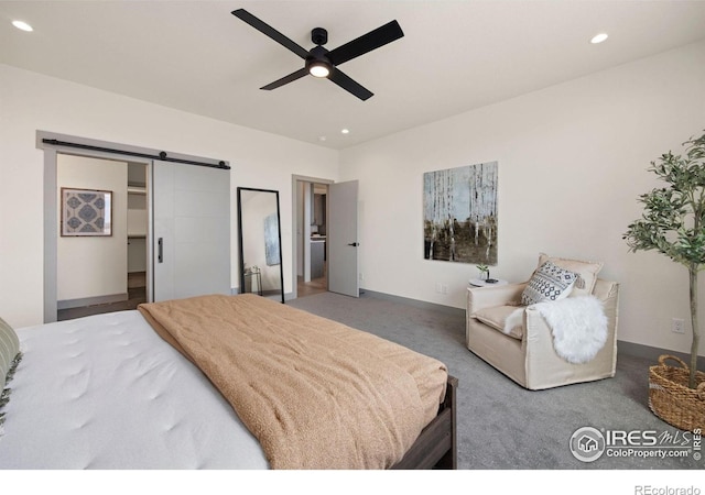 5016 Prairie Lark Ln, Severance, CO 80615 - carpeted bedroom with a barn door, recessed lighting, and ceiling fan