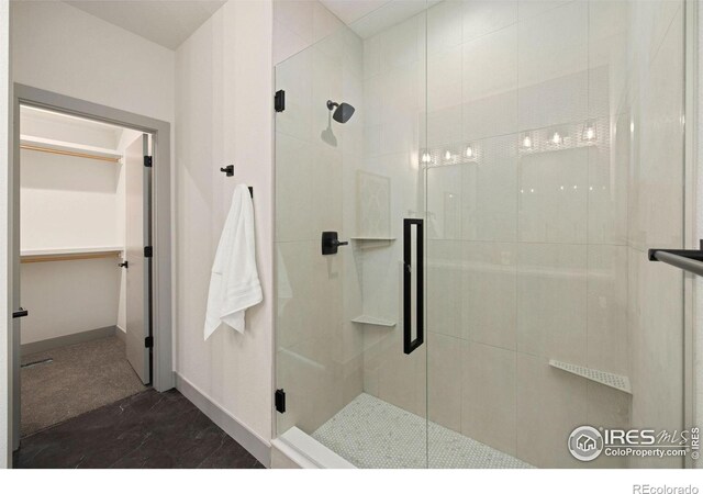 5016 Prairie Lark Ln, Severance, CO 80615 - full bath with a stall shower and a spacious closet