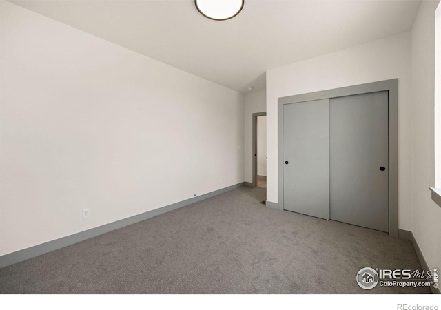 5016 Prairie Lark Ln, Severance, CO 80615 - unfurnished bedroom with carpet flooring and a closet
