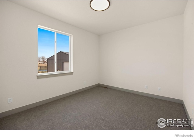 5016 Prairie Lark Ln, Severance, CO 80615 - carpeted spare room with baseboards