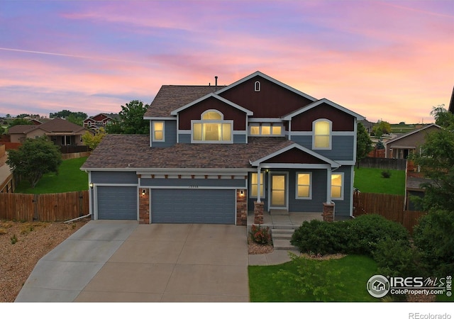 13598 Horseshoe Cir, Mead, CO 80542 - traditional home with driveway and a garage