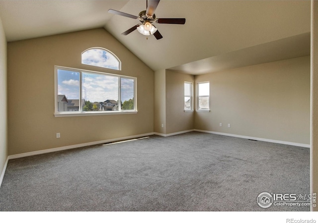 13598 Horseshoe Cir, Mead, CO 80542 - unfurnished room with a ceiling fan, carpet, vaulted ceiling, and baseboards