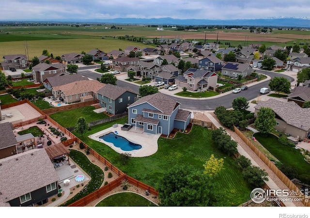 13598 Horseshoe Cir, Mead, CO 80542 - aerial perspective of suburban area with a pool area