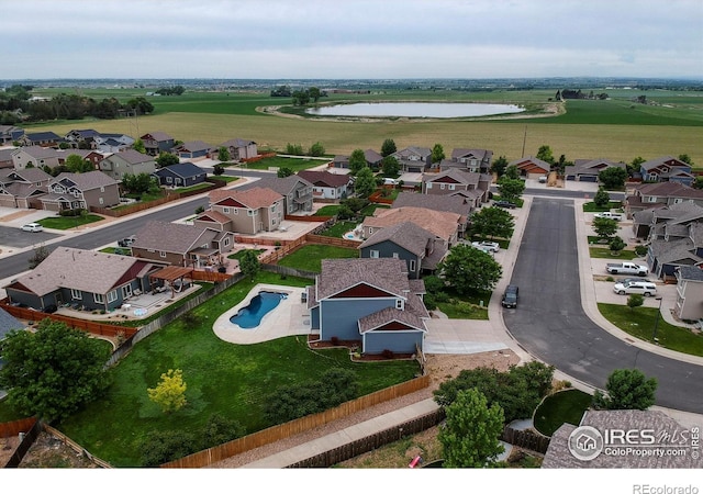 13598 Horseshoe Cir, Mead, CO 80542 - aerial view of residential area featuring a pool area and a large body of water
