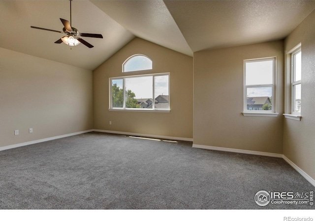 13598 Horseshoe Cir, Mead, CO 80542 - unfurnished room featuring plenty of natural light, carpet flooring, lofted ceiling, a ceiling fan, and baseboards