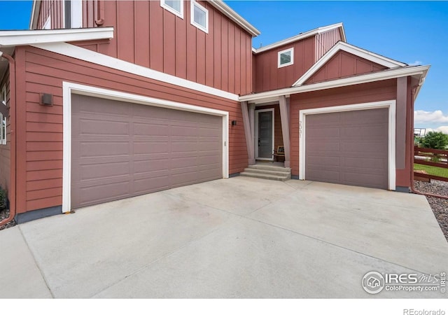 2031 Moon Rise Dr, Windsor, CO 80550 - view of front of home with driveway and board and batten siding