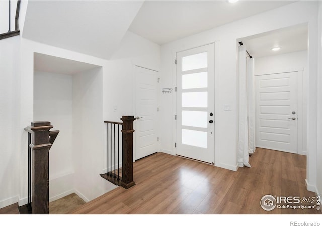 2031 Moon Rise Dr, Windsor, CO 80550 - foyer entrance with wood finished floors, baseboards, and recessed lighting