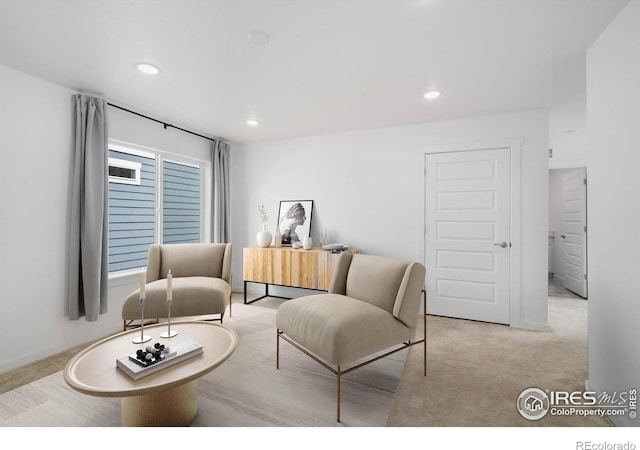 2031 Moon Rise Dr, Windsor, CO 80550 - living area featuring light carpet and recessed lighting