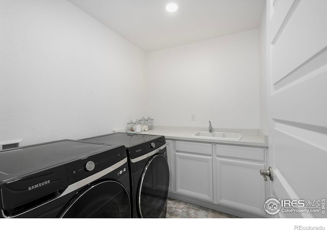 2031 Moon Rise Dr, Windsor, CO 80550 - laundry area featuring washer and clothes dryer, cabinet space, and recessed lighting