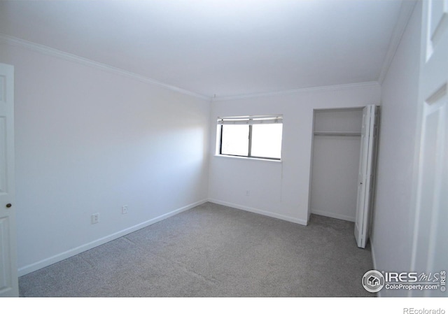 30 S Boulder Cir Unit 30182102, Boulder, CO 80303 - unfurnished bedroom featuring carpet floors, crown molding, a closet, and baseboards