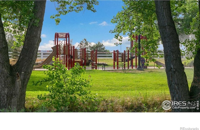 6506 13th St, Frederick, CO 80530 - community jungle gym featuring a yard