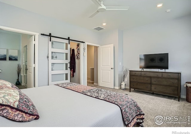 14553 W 91st Dr Unit A, Arvada, CO 80005 - bedroom with recessed lighting, a barn door, carpet floors, and a ceiling fan