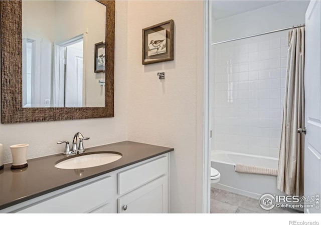 14553 W 91st Dr Unit A, Arvada, CO 80005 - bathroom with vanity, toilet, tile patterned floors, and shower / tub combo with curtain