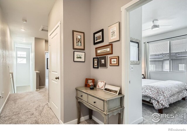14553 W 91st Dr Unit A, Arvada, CO 80005 - hall featuring carpet, baseboards, and an upstairs landing