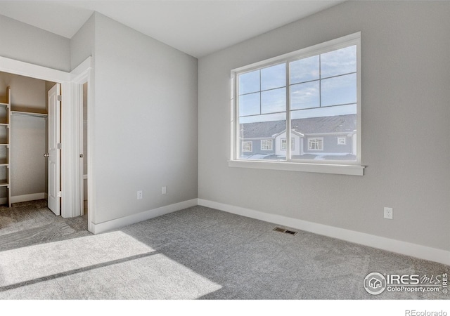 4173 Trapper Lake Dr, Loveland, CO 80538 - unfurnished bedroom with carpet floors and baseboards