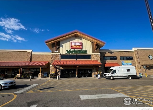 2446 W 167th Ln, Broomfield, CO 80023 - view of commercial property with uncovered parking