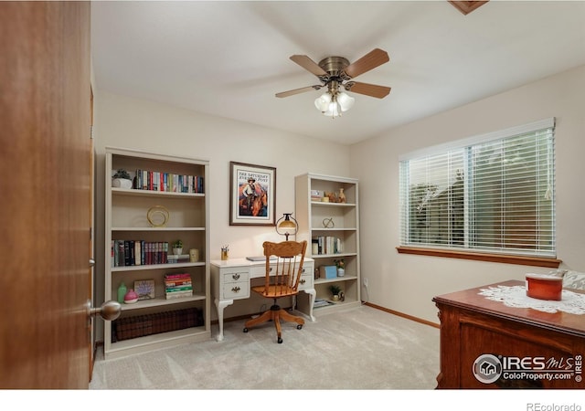 5603 Pierson Mountain Ave, Longmont, CO 80503 - carpeted office space featuring baseboards and a ceiling fan
