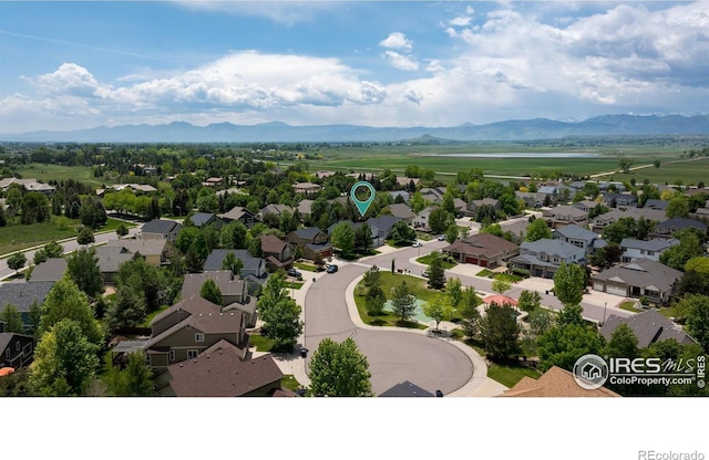 5603 Pierson Mountain Ave, Longmont, CO 80503 - aerial view of residential area with mountains