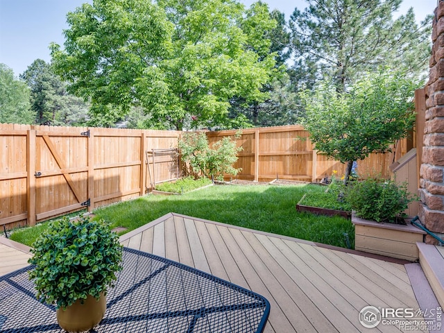4800 Osage Dr Unit 12B, Boulder, CO 80303 - wooden deck with a vegetable garden