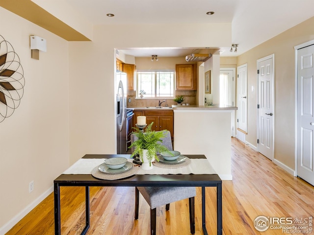 4800 Osage Dr Unit 12B, Boulder, CO 80303 - dining space featuring light wood-style flooring and baseboards