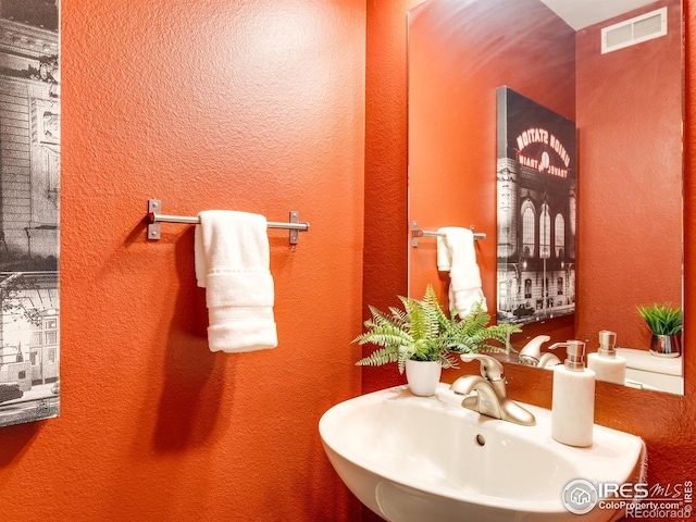 4800 Osage Dr Unit 12B, Boulder, CO 80303 - bathroom featuring a sink and a textured wall