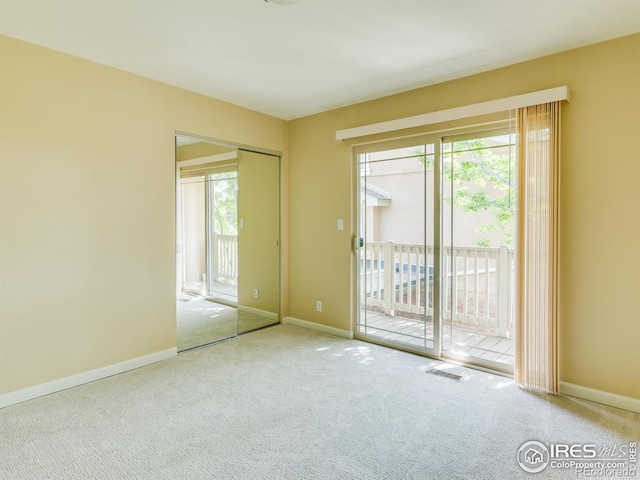 4800 Osage Dr Unit 12B, Boulder, CO 80303 - carpeted spare room with healthy amount of natural light and baseboards
