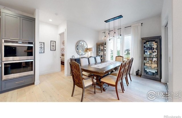 2790 Heron Lakes Pkwy, Berthoud, CO 80513 - dining room with light wood-type flooring, recessed lighting, and baseboards