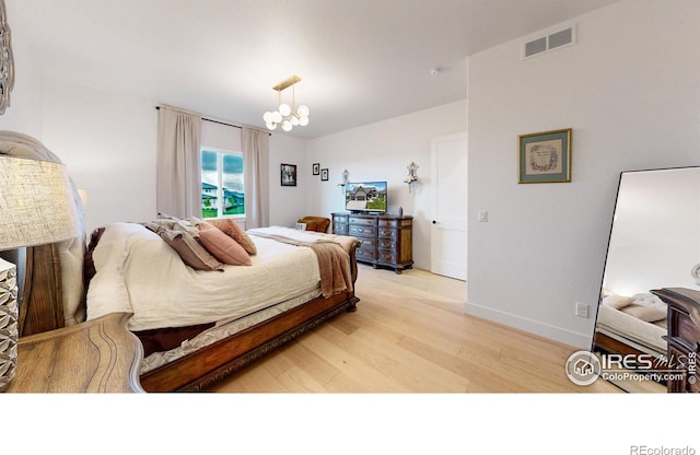 2790 Heron Lakes Pkwy, Berthoud, CO 80513 - bedroom featuring light wood finished floors and baseboards